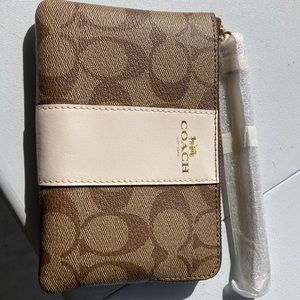Brand new coach wallet. $29